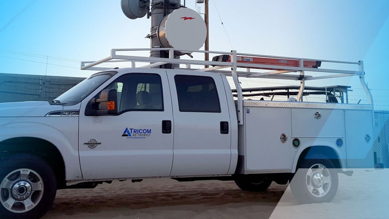 Tricom work truck